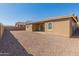 Spacious backyard with gravel landscaping and block wall at 24741 N 175Th Dr, Surprise, AZ 85387