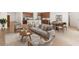 Open living room featuring hardwood floors and modern furniture at 24741 N 175Th Dr, Surprise, AZ 85387