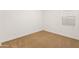 Simple carpeted bedroom with neutral walls and window at 24741 N 175Th Dr, Surprise, AZ 85387