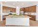 Modern kitchen with granite countertops and wood cabinets at 24741 N 175Th Dr, Surprise, AZ 85387
