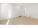 Spacious living room with neutral color palette and natural light at 24741 N 175Th Dr, Surprise, AZ 85387