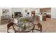 Virtually staged dining room and living area at 24741 N 175Th Dr, Surprise, AZ 85387