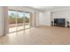 Living room with sliding glass doors leading to the backyard at 24741 N 175Th Dr, Surprise, AZ 85387