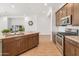 Modern kitchen with stainless steel appliances and granite countertops at 24741 N 175Th Dr, Surprise, AZ 85387