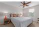 Main bedroom with ceiling fan and ample natural light at 955 S Henry Ln, Gilbert, AZ 85296