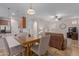 Open concept dining area with table and chairs next to kitchen at 955 S Henry Ln, Gilbert, AZ 85296