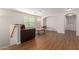 Spacious loft area with wood floors and a seating area at 955 S Henry Ln, Gilbert, AZ 85296