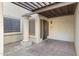 Front entry with a pergola and a tiled floor at 10836 N 29Th Ave, Phoenix, AZ 85029