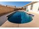 Relaxing kidney-shaped pool, great for summer at 13355 W Virginia Ave, Goodyear, AZ 85395