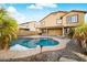 Stunning two story home with a beautiful pool and backyard at 16800 W Mesquite Dr, Goodyear, AZ 85338