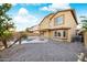 Home with a refreshing pool, fire pit, and gravel backyard at 16800 W Mesquite Dr, Goodyear, AZ 85338