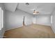 Spacious Primary bedroom with ceiling fan and window at 16800 W Mesquite Dr, Goodyear, AZ 85338