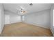 Bright bedroom with ceiling fan and neutral walls at 16800 W Mesquite Dr, Goodyear, AZ 85338
