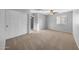 Bright bedroom with carpet flooring and ceiling fan at 16800 W Mesquite Dr, Goodyear, AZ 85338