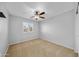 Well-lit bedroom with ceiling fan and window at 16800 W Mesquite Dr, Goodyear, AZ 85338