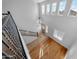 Two-story entryway with hardwood floors and chandelier at 16800 W Mesquite Dr, Goodyear, AZ 85338