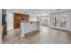 Kitchen with wood cabinets, granite countertops, and an island at 16800 W Mesquite Dr, Goodyear, AZ 85338