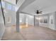 Two-story living room with hardwood floors, high ceilings, and a loft area at 16800 W Mesquite Dr, Goodyear, AZ 85338