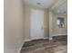 Bright entryway with wood-look floors and a white door at 4742 S Twinleaf Dr, Gilbert, AZ 85297