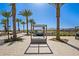 Relaxing poolside daybed under a shaded cabana at 11288 N San Clemente St, Surprise, AZ 85388