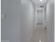 Long hallway with tile flooring and access to other rooms at 1859 N Morris --, Mesa, AZ 85201