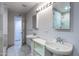 Double vanity bathroom with a shower and access to another room at 1859 N Morris --, Mesa, AZ 85201