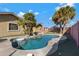 Inviting kidney-shaped pool surrounded by a stone patio at 1859 N Morris --, Mesa, AZ 85201