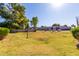 Expansive grassy area and mature trees near building at 520 N Stapley Dr # 193, Mesa, AZ 85203