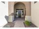 Elegant entryway with arched doorway and tile flooring at 42315 N Olympic Fields Ct, Anthem, AZ 85086