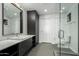 Modern bathroom with a single vanity and glass shower at 200 W Portland St # 614, Phoenix, AZ 85003