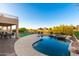 Luxury backyard oasis featuring a sparkling pool and spa at 10646 E Butherus Dr, Scottsdale, AZ 85255