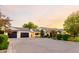 Long driveway leading to a gorgeous home at sunset at 2677 E Queen Creek Rd, Gilbert, AZ 85297