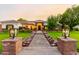 Brick house with a charming walkway and landscaping at 2677 E Queen Creek Rd, Gilbert, AZ 85297