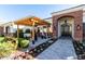 Covered patio with pergola and seating area at 2677 E Queen Creek Rd, Gilbert, AZ 85297