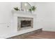 Elegant fireplace with granite surround and mantel at 2677 E Queen Creek Rd, Gilbert, AZ 85297