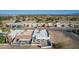 Aerial view of houses and a golf course in the neighborhood at 1804 S Pecos Dr, Casa Grande, AZ 85194