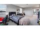 Bedroom with twin bed, dresser, and window with blinds at 10468 W Palm Ln, Avondale, AZ 85392