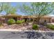 Beautiful home exterior with landscaping and desert accents at 41619 N River Bend Rd, Anthem, AZ 85086