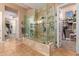 Elegant bathroom with a large walk-in shower and a spacious closet at 41619 N River Bend Rd, Anthem, AZ 85086