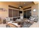 Relaxing patio with fire pit and seating area, perfect for outdoor entertaining at 41619 N River Bend Rd, Anthem, AZ 85086