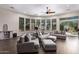 Open and bright living room with hardwood floors and a fireplace at 41619 N River Bend Rd, Anthem, AZ 85086