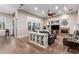 Bright living room featuring a fireplace and built-in shelving at 41619 N River Bend Rd, Anthem, AZ 85086