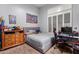Bright bedroom featuring a workspace and dresser at 41619 N River Bend Rd, Anthem, AZ 85086