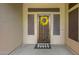 Elegant front door with decorative iron screen and wreath at 41619 N River Bend Rd, Anthem, AZ 85086