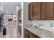 Kitchen with granite countertops and custom cabinetry at 41619 N River Bend Rd, Anthem, AZ 85086