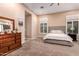 Main bedroom with a large window and plenty of closet space at 41619 N River Bend Rd, Anthem, AZ 85086