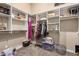 Spacious walk-in closet with ample shelving and hanging space at 41619 N River Bend Rd, Anthem, AZ 85086