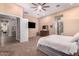 Spacious main bedroom with an ensuite bathroom and walk-in closet at 41619 N River Bend Rd, Anthem, AZ 85086