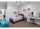 Charming bedroom with a comfortable bed, vanity, and ample closet space at 41619 N River Bend Rd, Anthem, AZ 85086