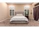 Main bedroom with a neutral color palette and ample natural light at 41619 N River Bend Rd, Anthem, AZ 85086